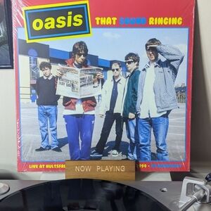 Oasis Vinyl Record with Blue and Red Cover